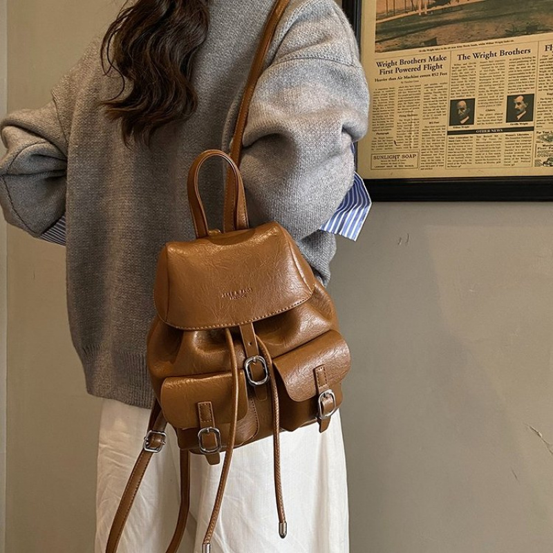 エレガントなレザーの女性用ショルダーバッグ、ハイエンドの高級 - Vintage Fashion Paris のレビューと価格